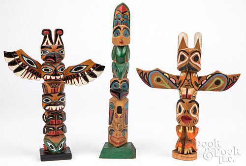 THREE ALASKAN INDIAN CARVED PAINTED