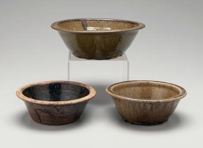 Three alkaline glaze bowls: one