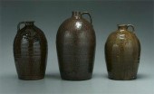Three alkaline glaze jugs: ovo
