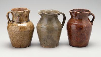 Three alkaline glaze pitchers:
