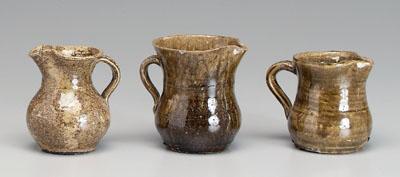 Three alkaline glaze pitchers:
