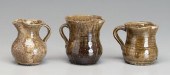 Three alkaline glaze pitchers: