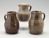 Three alkaline glaze pitchers:
