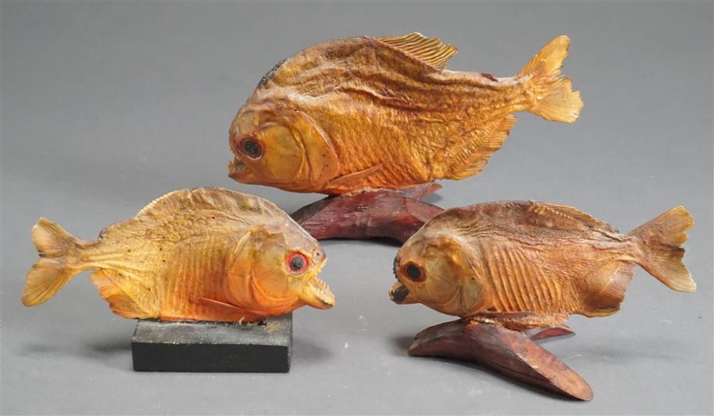 THREE AMAZONIAN FAUX TAXIDERMIED
