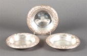 Three American repousse sterli