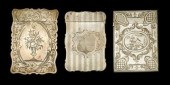 Three American silver card cas