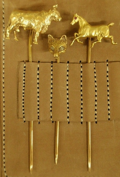 Three animal figural stickpins