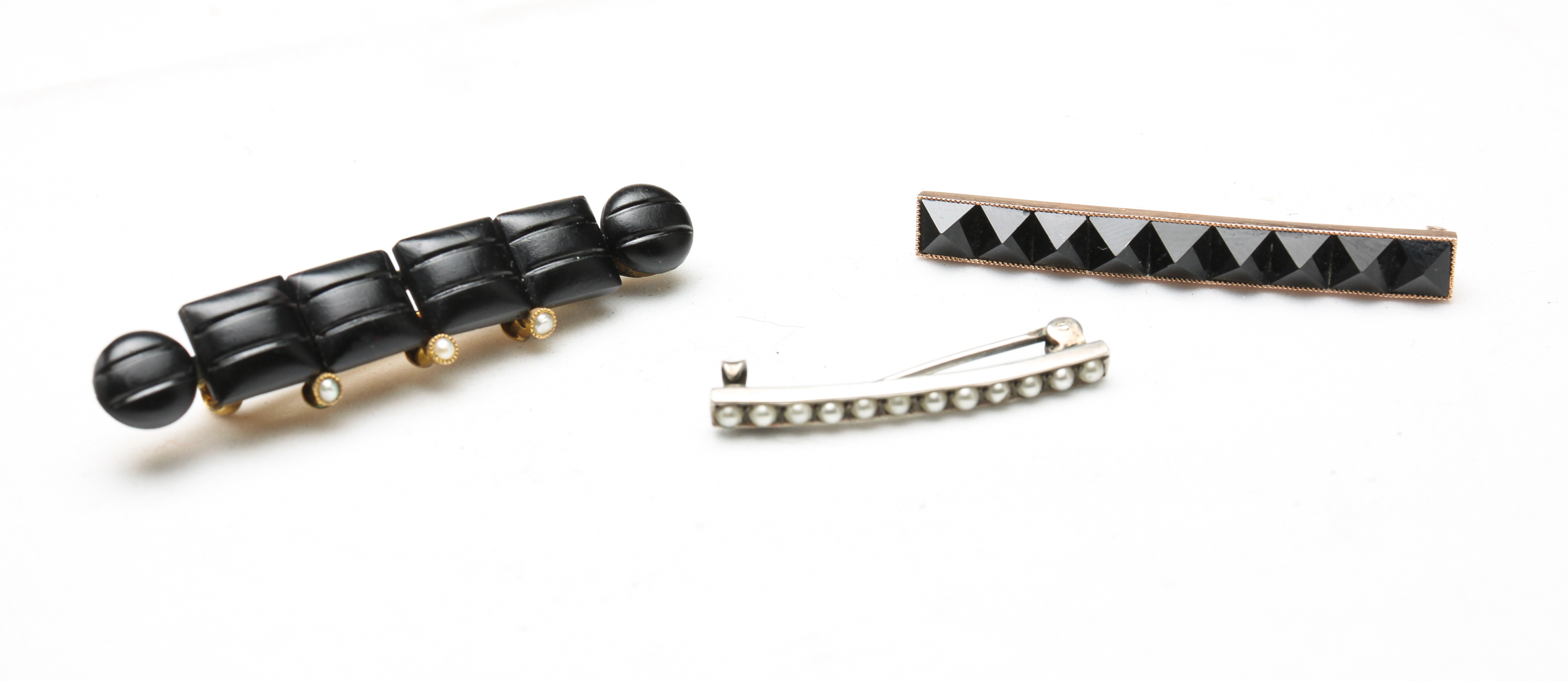 THREE ANTIQUE BAR PINS. Late 19th -