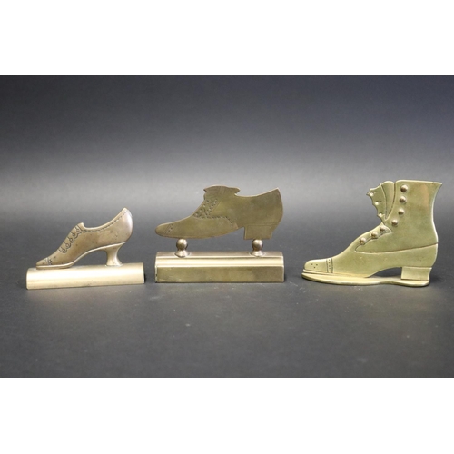 Three antique brass cut out boot