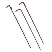 THREE ANTIQUE CANE WALKING STI