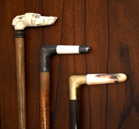 Three antique canes, including: a