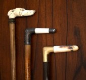 Three antique canes, including