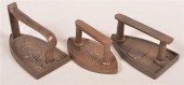 THREE ANTIQUE CAST IRON FLAT I