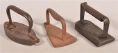 THREE ANTIQUE CAST IRON FLAT I