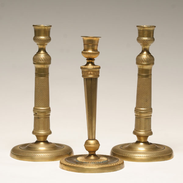 Three antique engraved brass