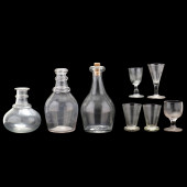 THREE ANTIQUE GLASS DECANTERS