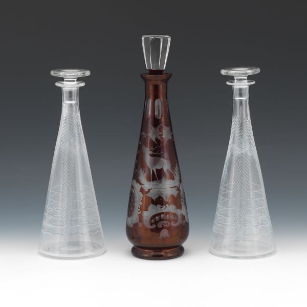 THREE ANTIQUE GLASS LIQUOR CARAFES