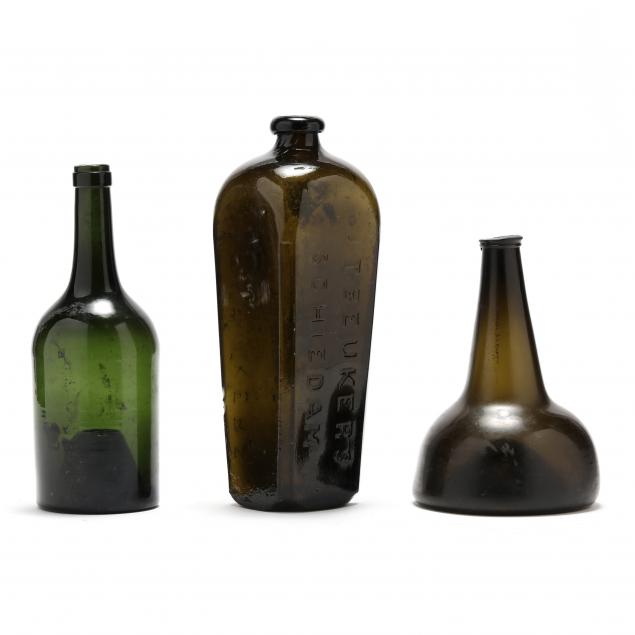 THREE ANTIQUE GREEN GLASS BOTTLES