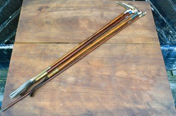 Three antique horse riding crops,