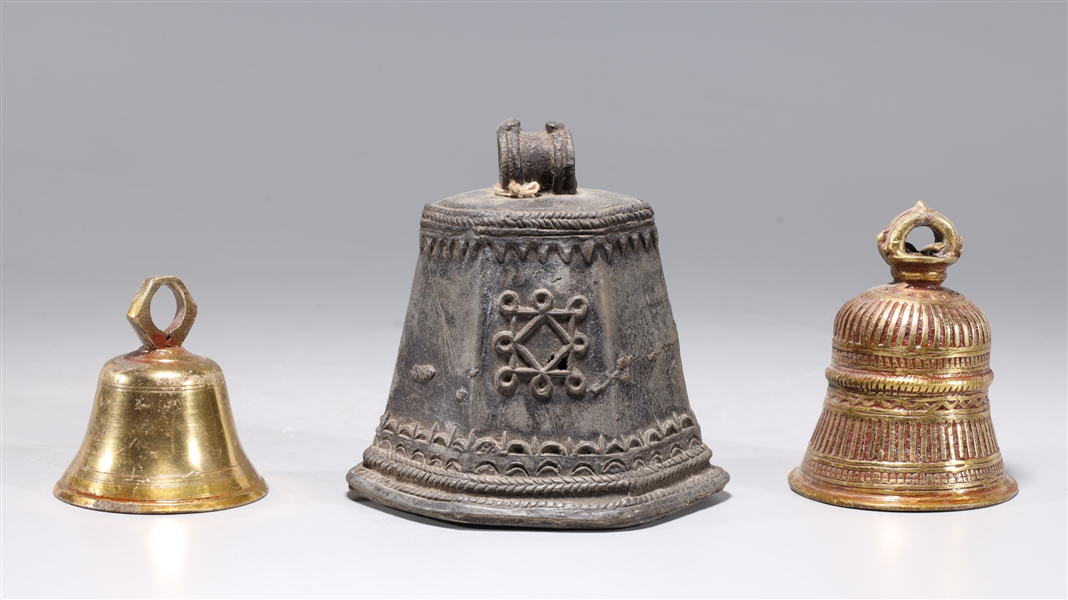 Three antique Indian metal bells of