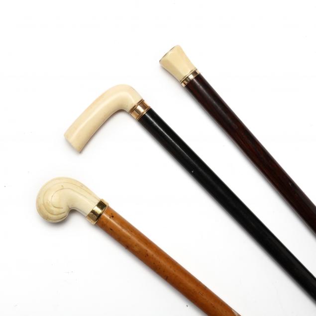 THREE ANTIQUE IVORY AND GOLD
