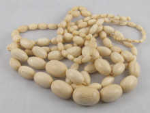 Three antique ivory bead