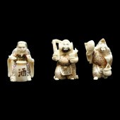 THREE ANTIQUE JAPANESE NETSUKE
