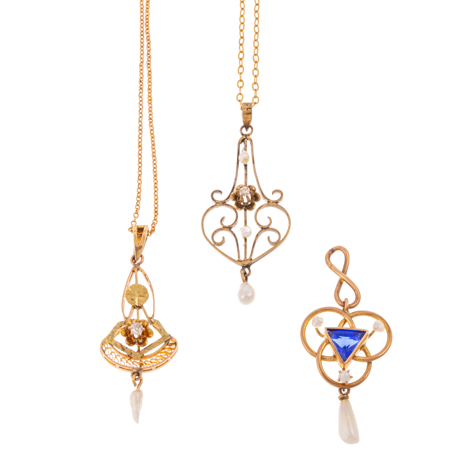 THREE ANTIQUE PENDANTS IN 10K