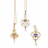 THREE ANTIQUE PENDANTS IN 10K