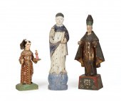 THREE ANTIQUE POLYCHROMED FIGU
