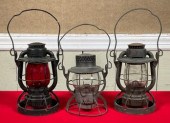 Three antique railroad lantern