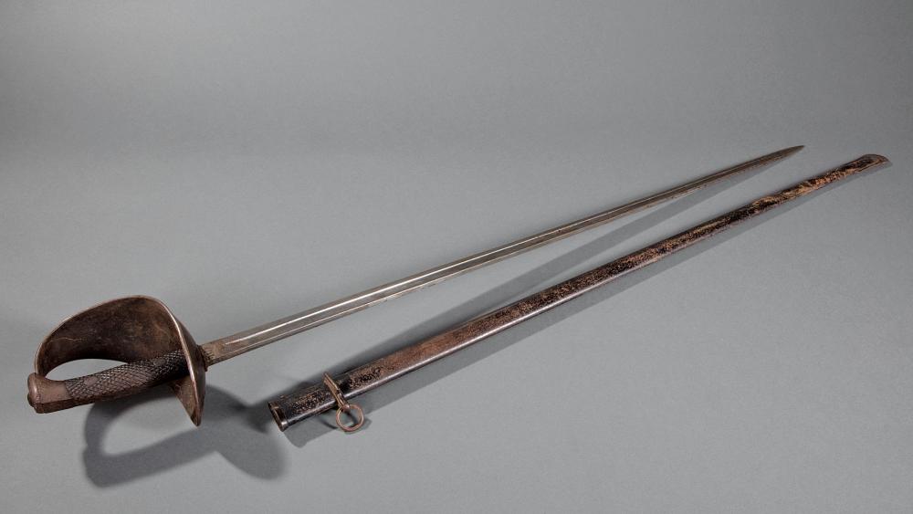 THREE ANTIQUE SPANISH SWORDSThree