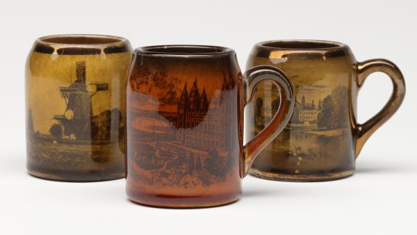 THREE ANTIQUE STRIKER MUGSThe