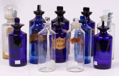 Three apothecary blue glass drug