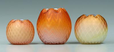 Three apricot rose bowls: one