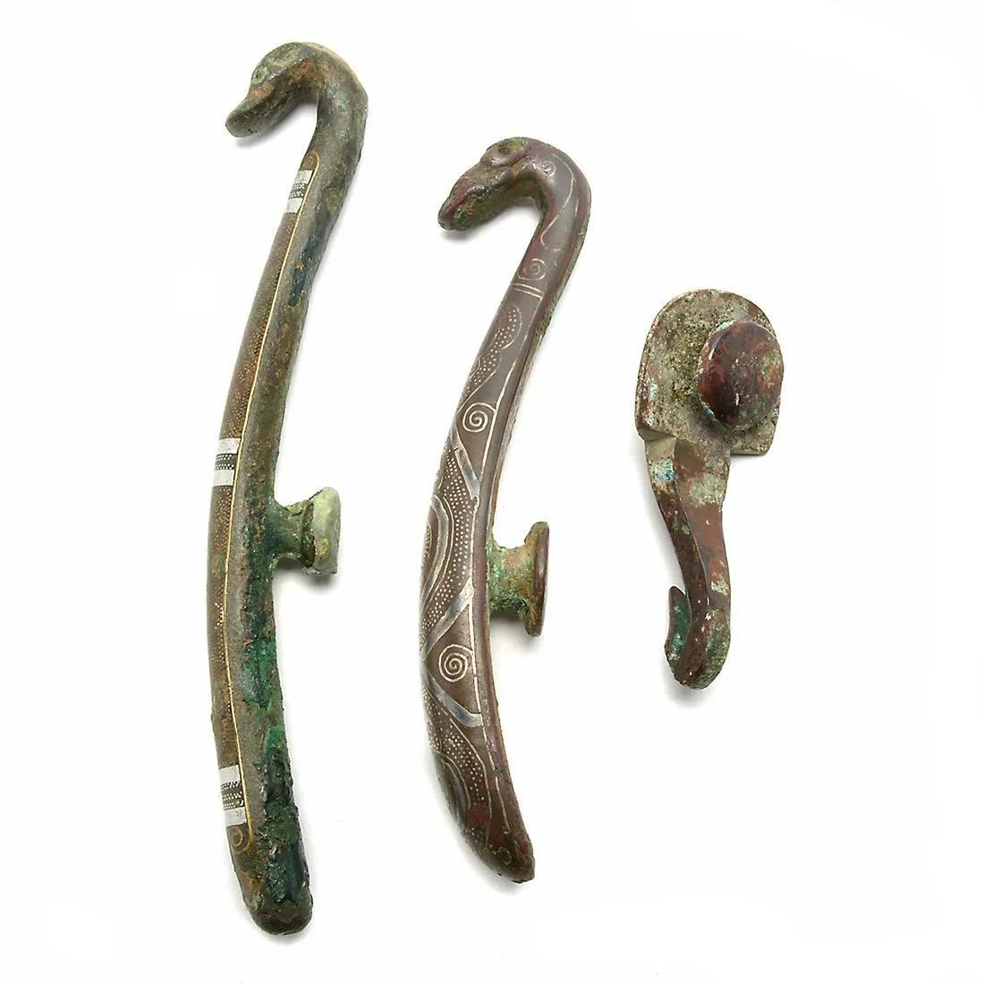 THREE ARCHAISTIC SILVER AND GOLD