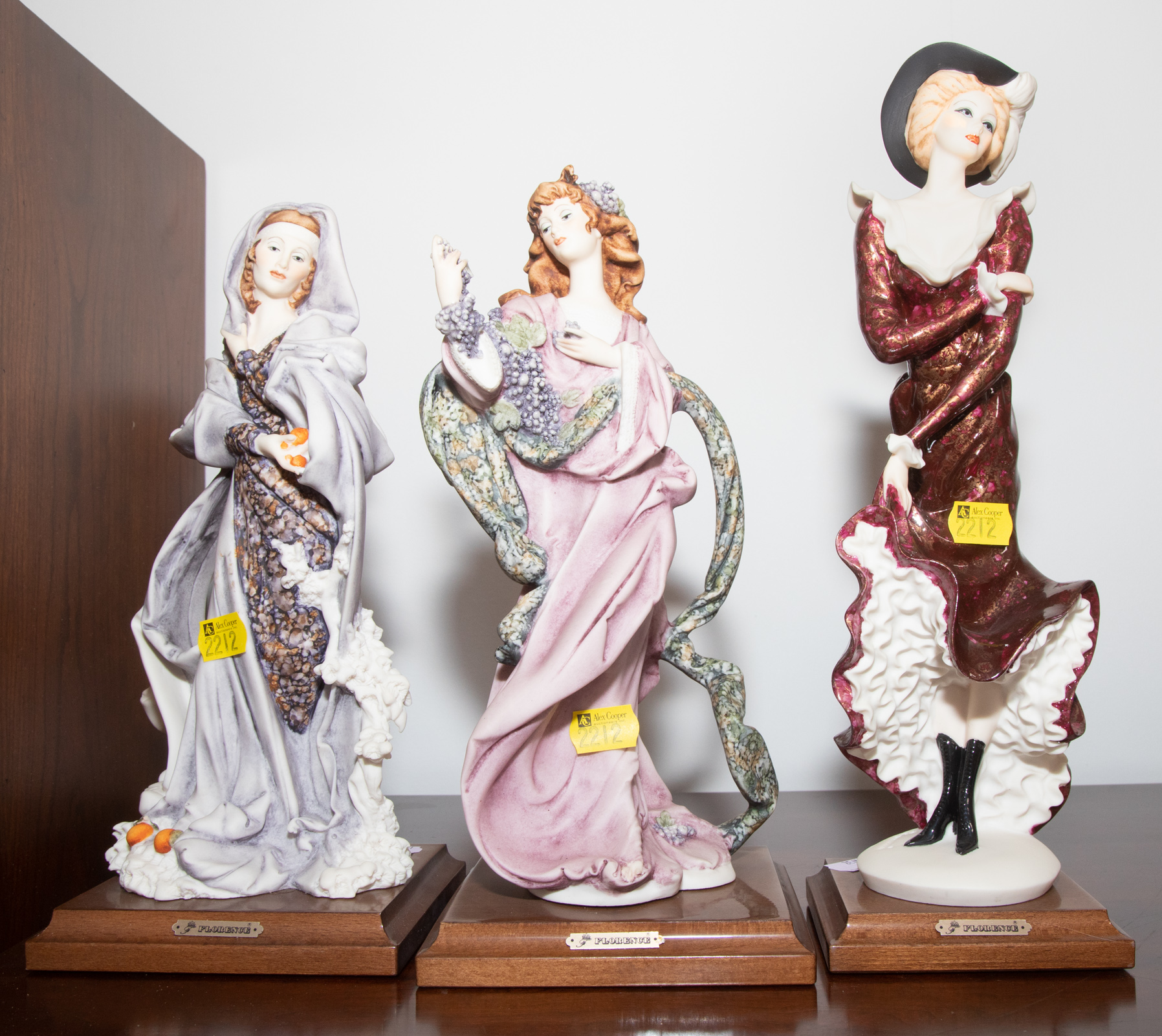 THREE ARMANI FIGURES Of elegant