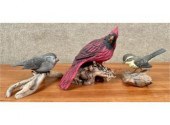 Three artisan carved bird figu