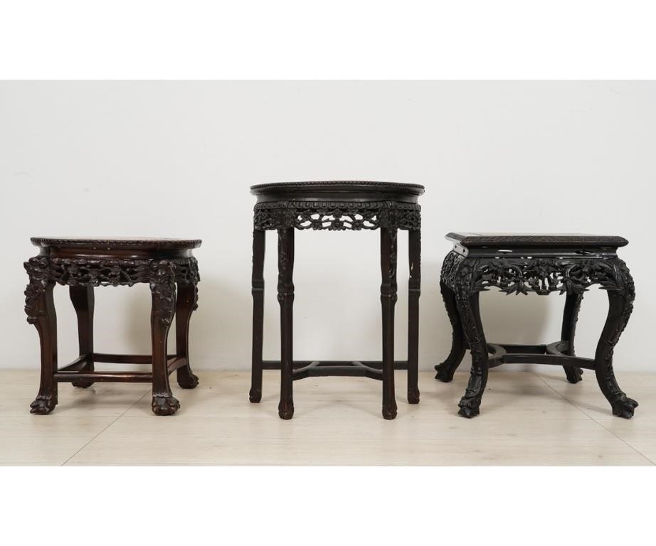 Three Asian carved plant stands,
