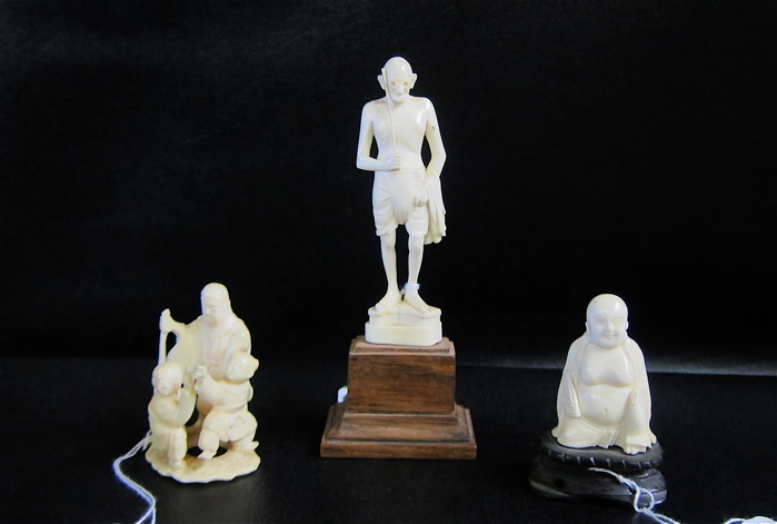 THREE ASIAN IVORY CARVED FIGURES: