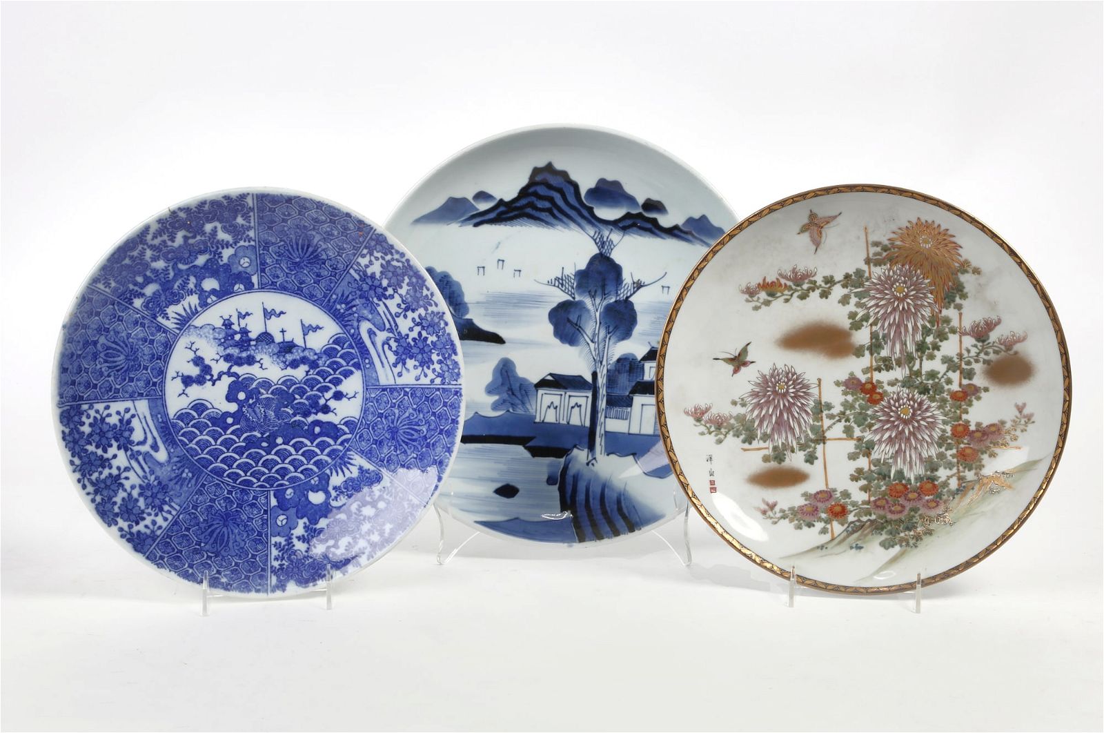 THREE ASIAN PORCELAIN PLATESThree