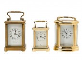 THREE ASSORTED BRASS CARRIAGE
