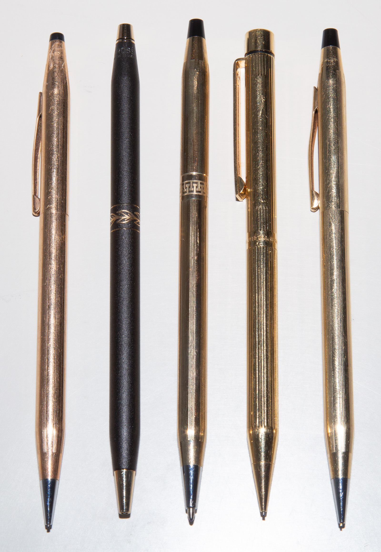 THREE ASSORTED MECHANICAL PENCILS &