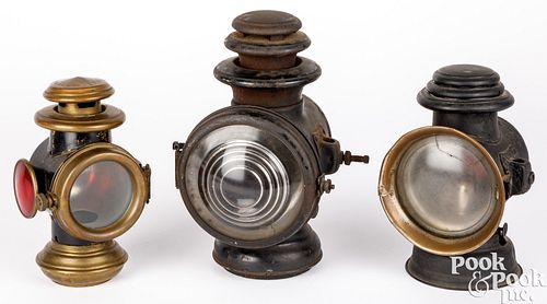 THREE AUTOMOBILE LIGHTSThree
