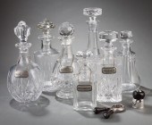 THREE BACCARAT CRYSTAL DECANTE