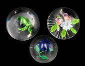 THREE BACCARAT GLASS PAPERWEIG