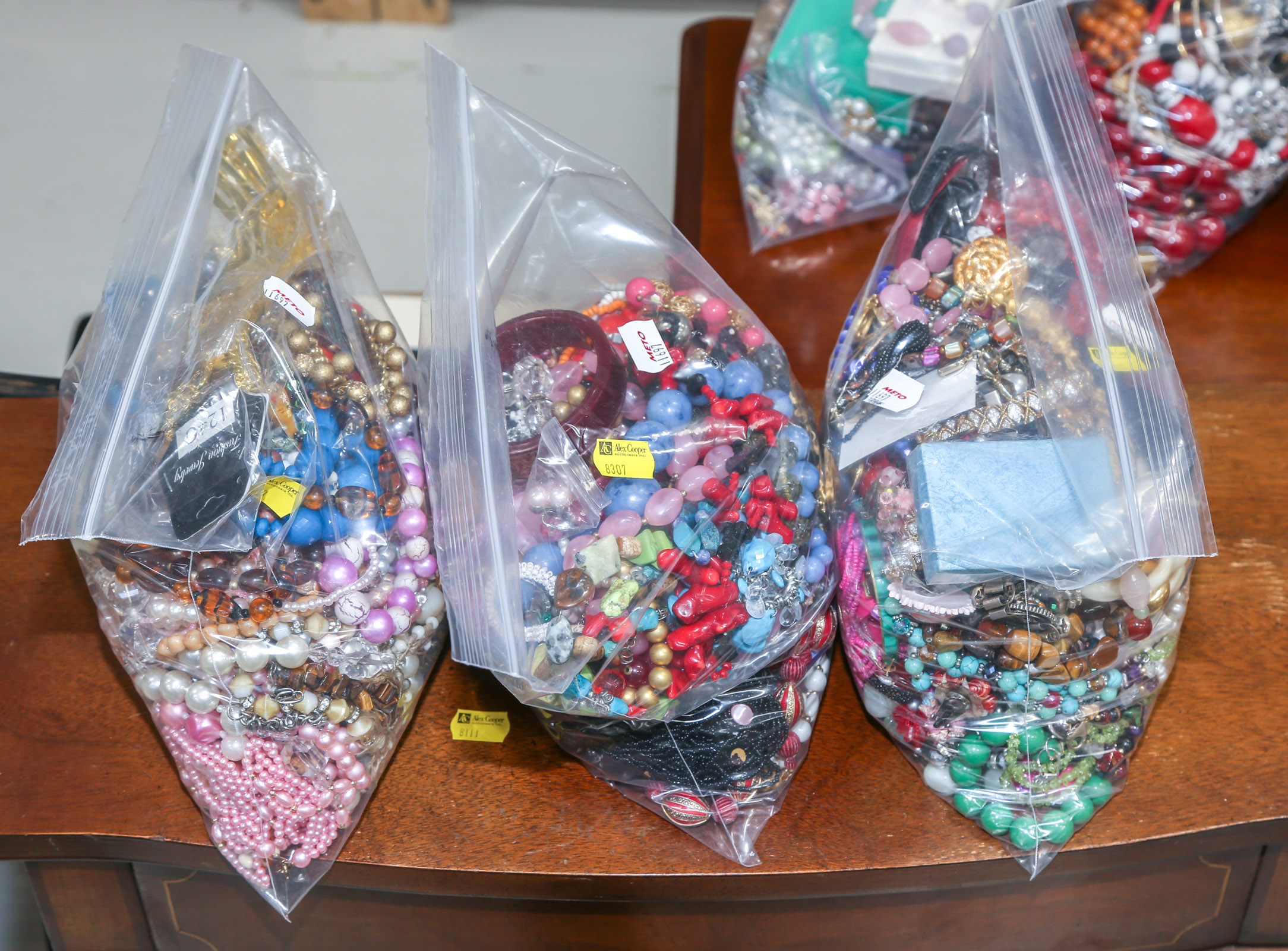 THREE BAGS OF COSTUME JEWELRY