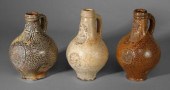 Three Bellarmine jugs, all wit