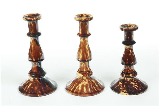 THREE BENNINGTON CANDLESTICKS. 