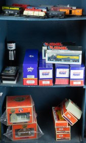 THREE BINS OF MODEL TRAINS AND